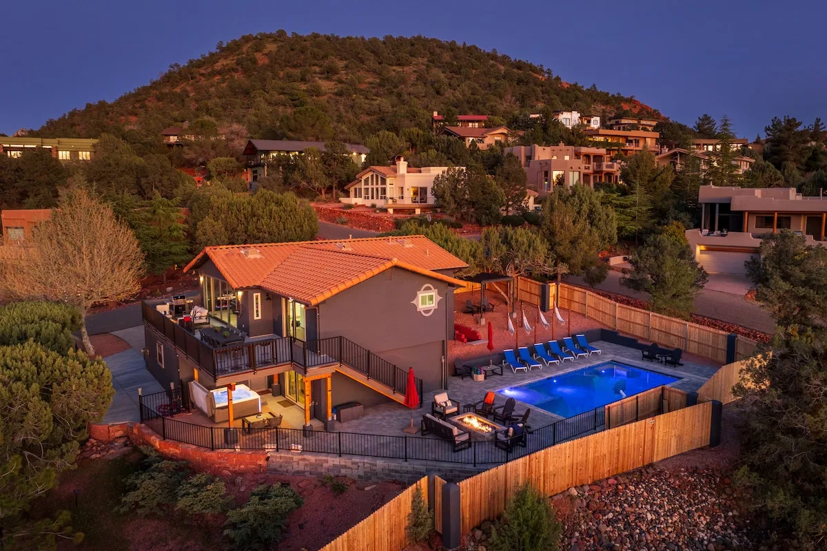 Deck level above and pool patio level below. This property has space and amenities for everyone.